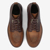 Top view of a pair of brown lace-up leather shoes with two tones, darker around the top and lighter on the toe area.