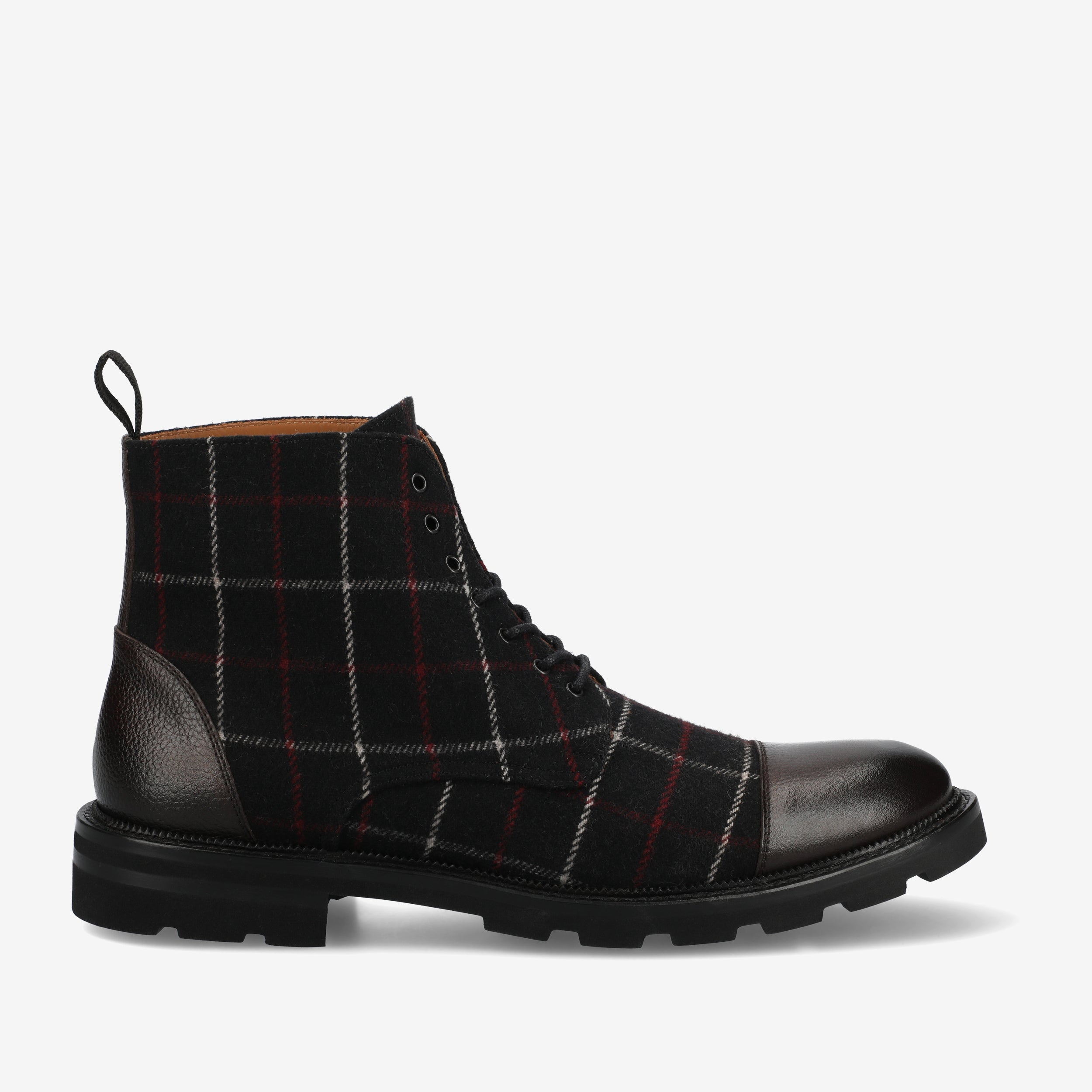 Side view of a black leather lace-up boot with a checkered fabric pattern on the upper and a pull tab on the back.