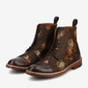 A pair of lace-up leather boots with a floral pattern on the sides, featuring brown soles and pull tabs at the back.