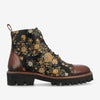 A black ankle boot with a floral pattern and brown leather accents, featuring a thick rubber sole and lace-up front.