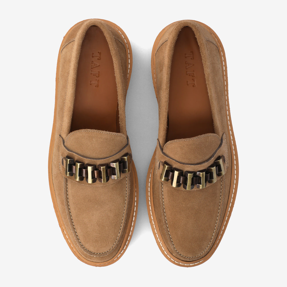 Pair of beige suede loafers with a chain detail across the top, branded 'TAFT' inside, viewed from above on a white background.