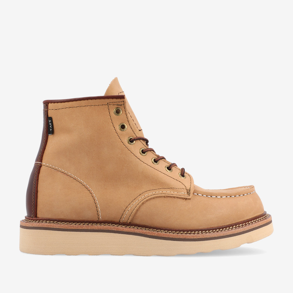 Side profile of a single tan leather ankle boot with brown laces, metal eyelets, a white rubber sole, and brown detailing around the ankle and heel.