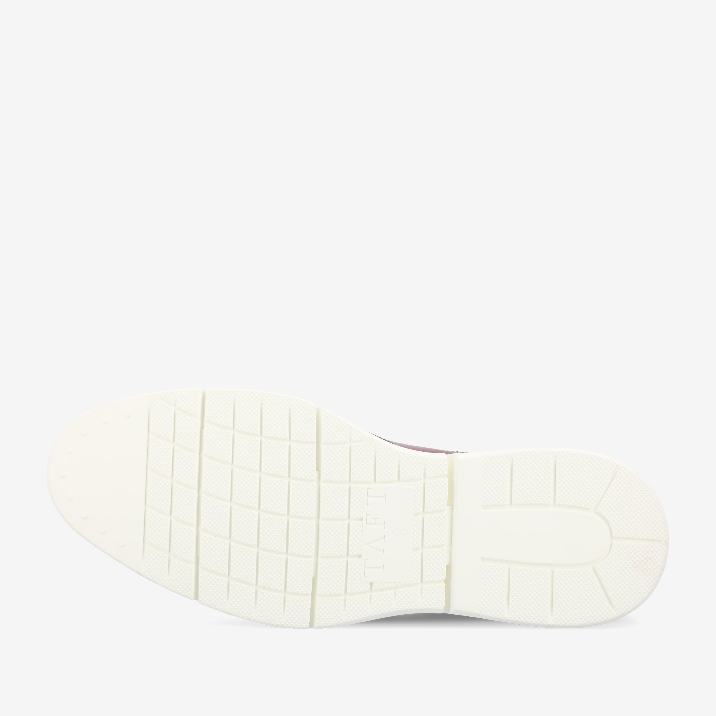 The image shows the bottom view of a white rubber shoe sole with the word TAP embossed in the center.