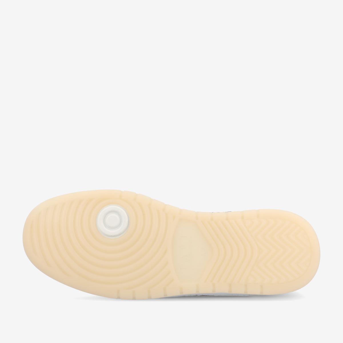 The image shows the sole of a sneaker with a light beige coloration and various textured patterns, including circular and linear designs, for traction.