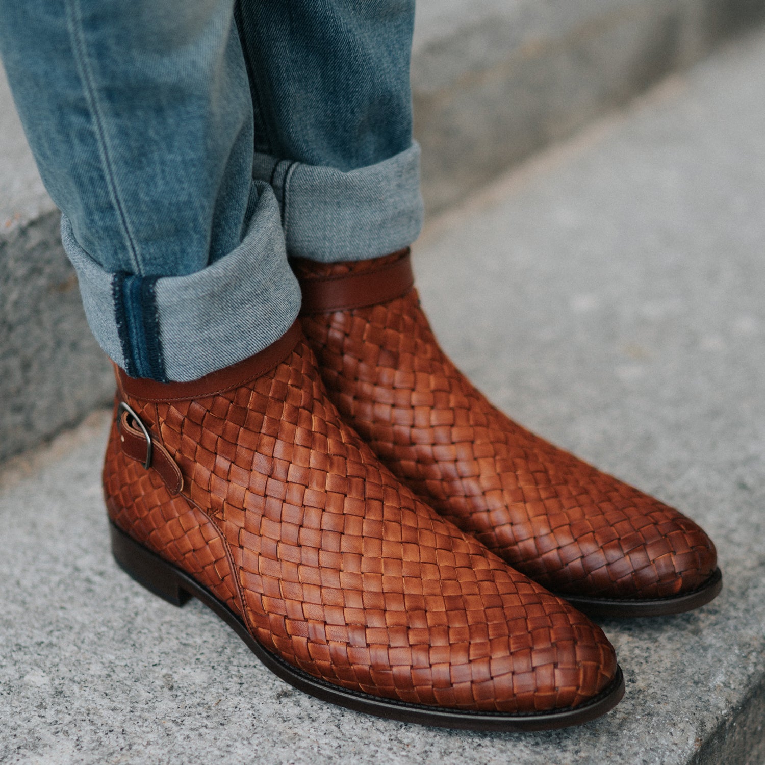 The Dylan Boot in Woven on a model standing on the ground