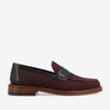 A side view of a red and black checkered loafer with a black leather band and wooden sole.