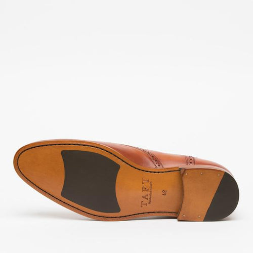Bottom view of a brown leather dress shoe showing the sole and heel.